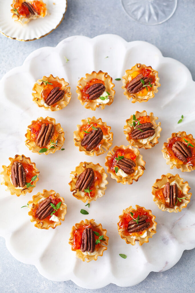 Cream Cheese and Pepper Jelly Phyllo Cups with Pecan Half