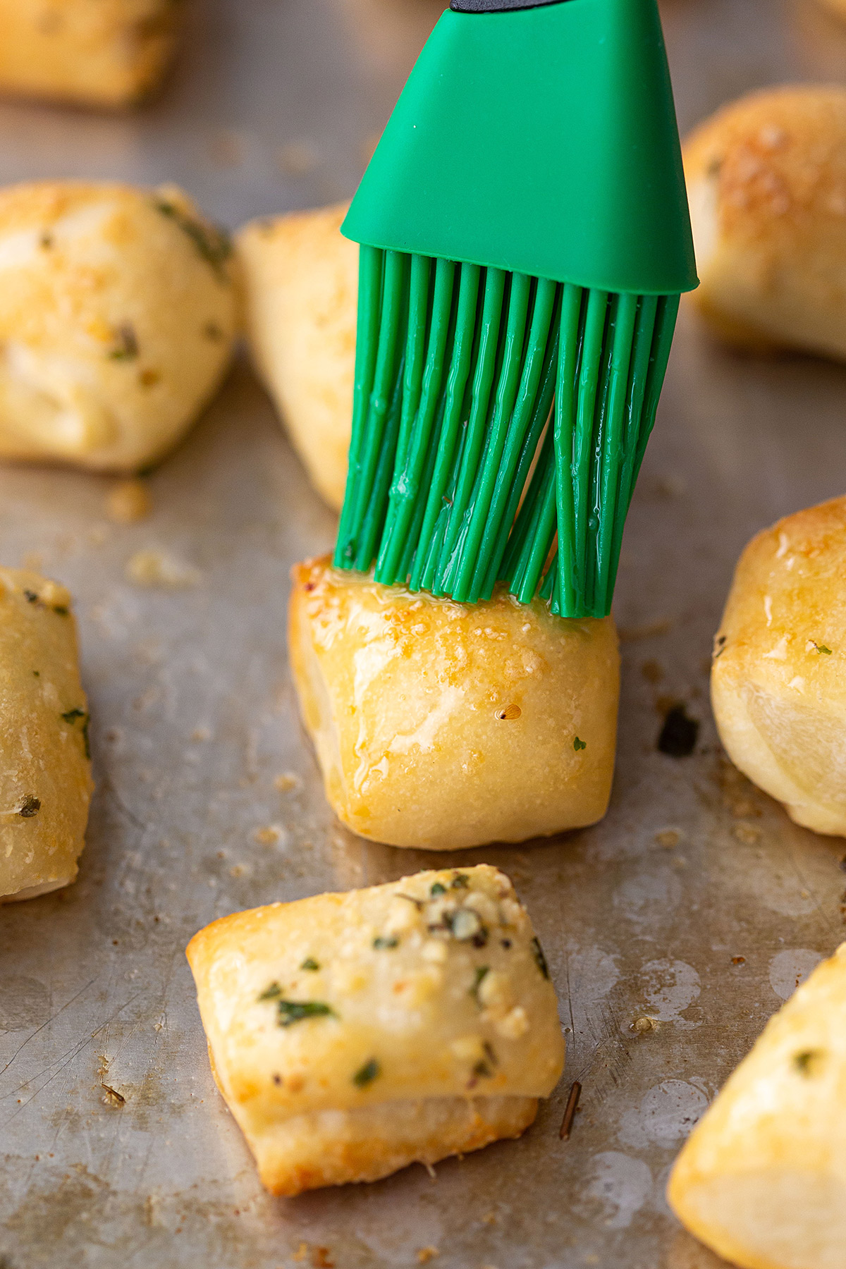 Brushing Garlic Butter on Bread Bites