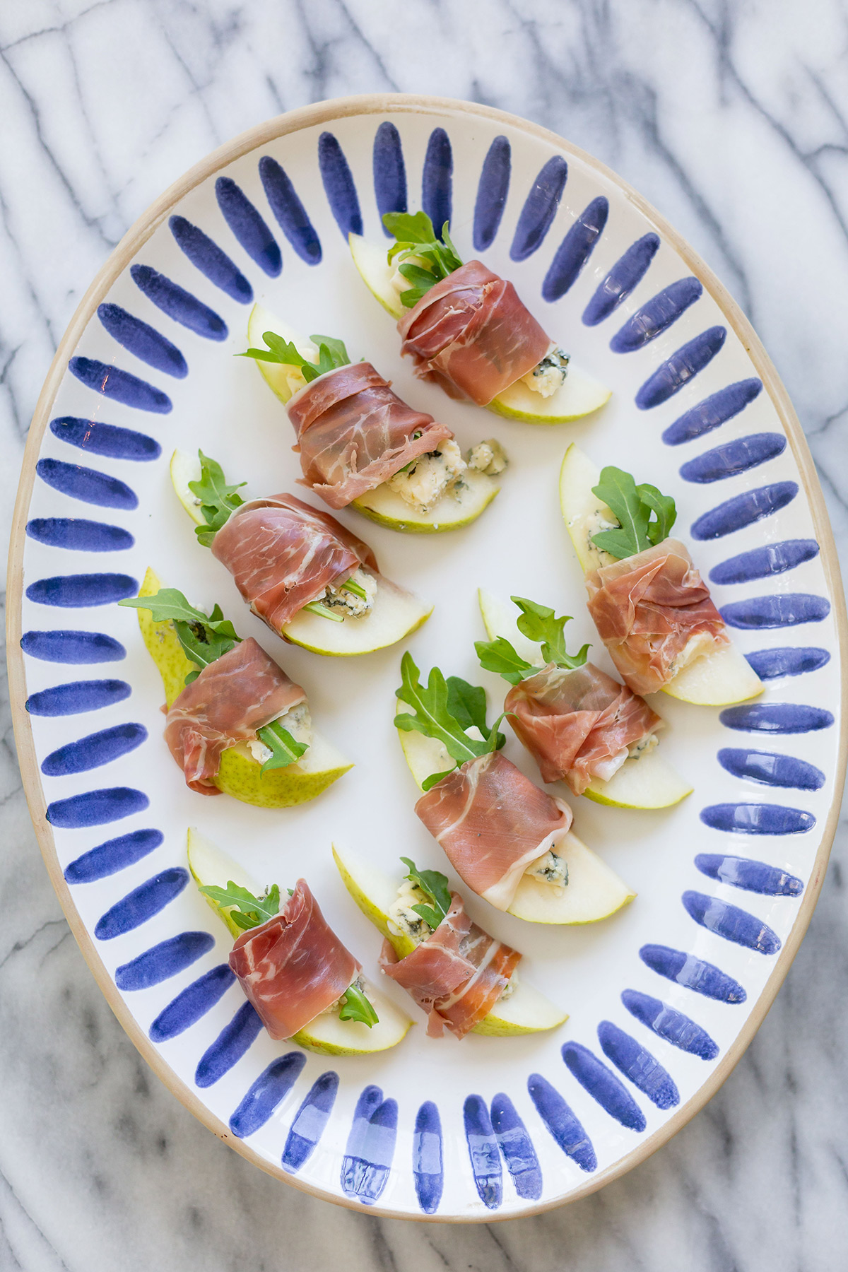 Pear Appetizer with Prosciutto, Blue Cheese and Arugula